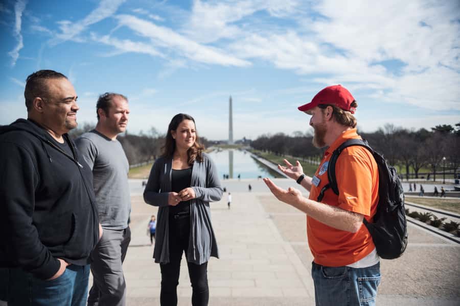 DC: National Mall 2.5 Hr Tour & Washington Monument Tickets - Reading names at the Vietnam Veterans Memorial